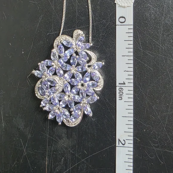 Elegant Silver and Tanzanite Jewelry Set - Picture 10 of 11